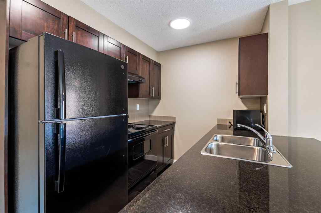 MLS® A2253595 - Unit #1407 403 Mackenzie Way SW in Downtown Airdrie, Residential