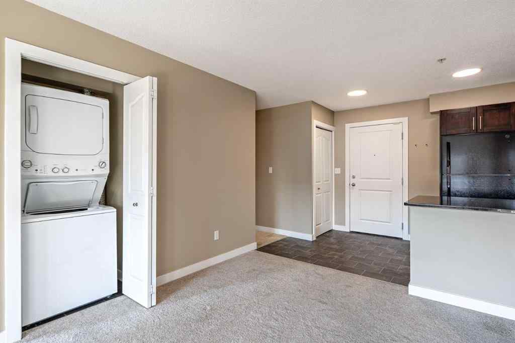 MLS® A2253595 - Unit #1407 403 Mackenzie Way SW in Downtown Airdrie, Residential