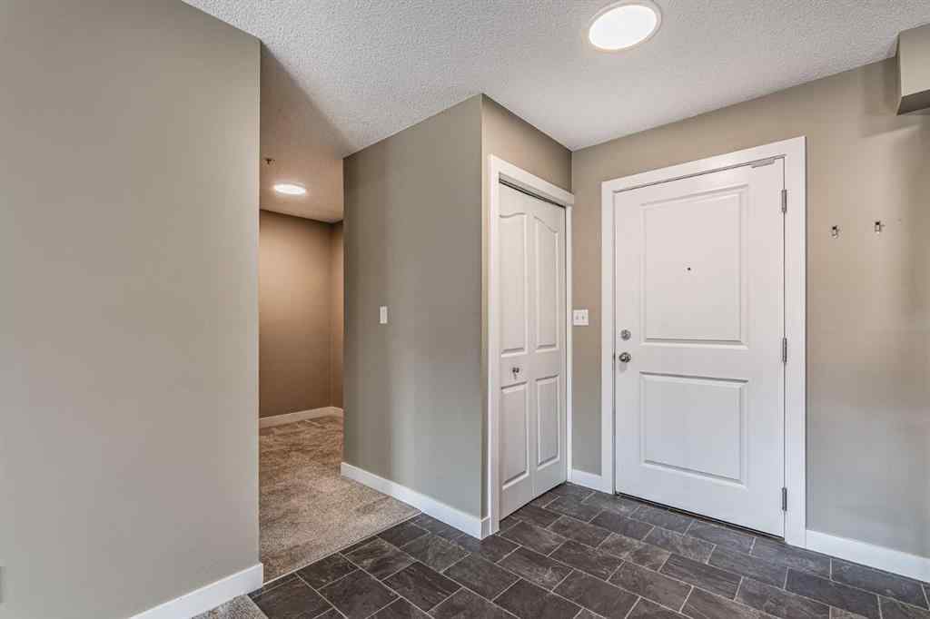 MLS® A2253595 - Unit #1407 403 Mackenzie Way SW in Downtown Airdrie, Residential
