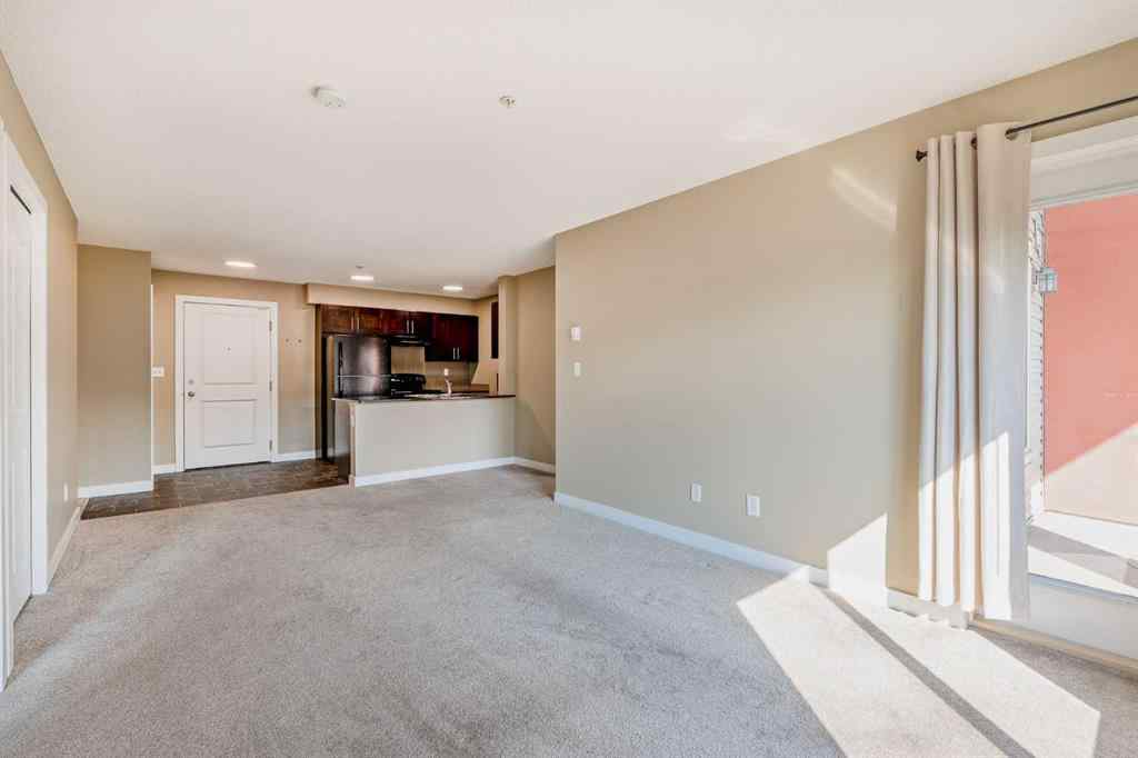 MLS® A2253595 - Unit #1407 403 Mackenzie Way SW in Downtown Airdrie, Residential