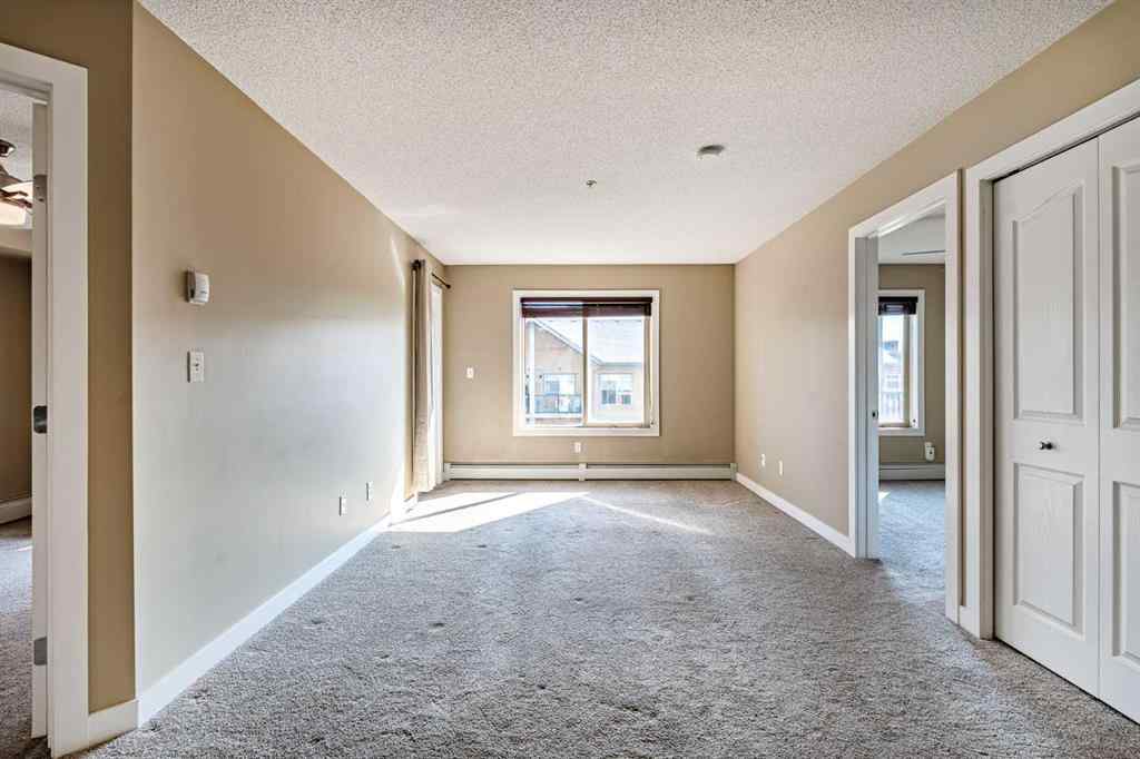 MLS® A2253595 - Unit #1407 403 Mackenzie Way SW in Downtown Airdrie, Residential