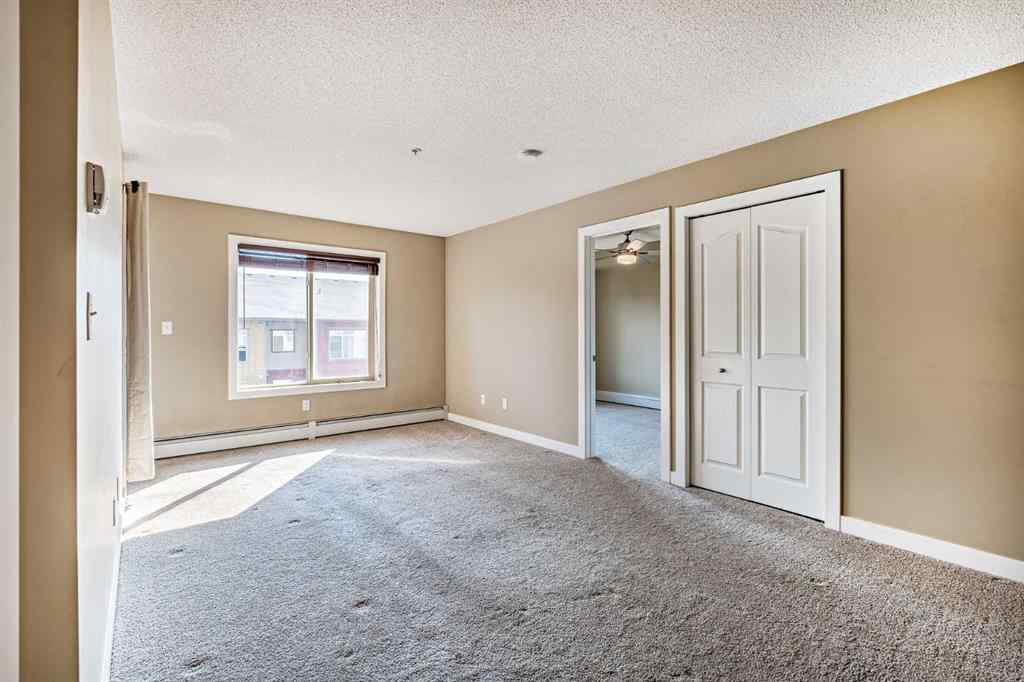 MLS® A2253595 - Unit #1407 403 Mackenzie Way SW in Downtown Airdrie, Residential