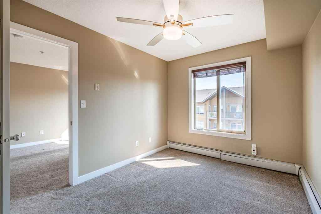 MLS® A2253595 - Unit #1407 403 Mackenzie Way SW in Downtown Airdrie, Residential