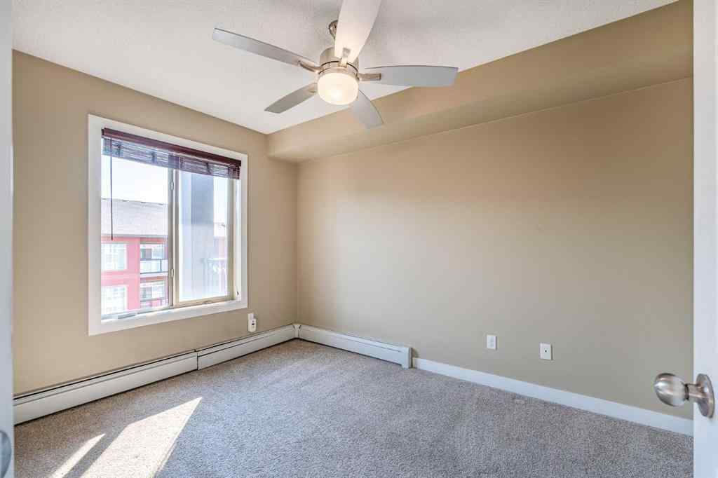 MLS® A2253595 - Unit #1407 403 Mackenzie Way SW in Downtown Airdrie, Residential