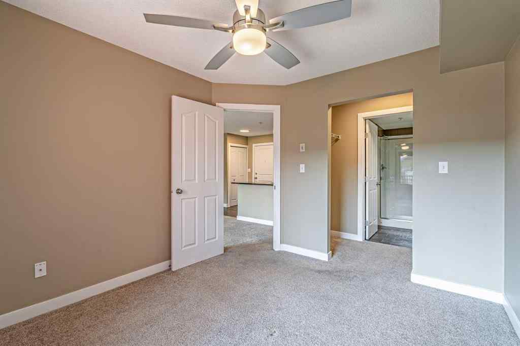 MLS® A2253595 - Unit #1407 403 Mackenzie Way SW in Downtown Airdrie, Residential