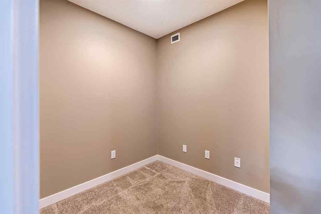 MLS® A2253595 - Unit #1407 403 Mackenzie Way SW in Downtown Airdrie, Residential