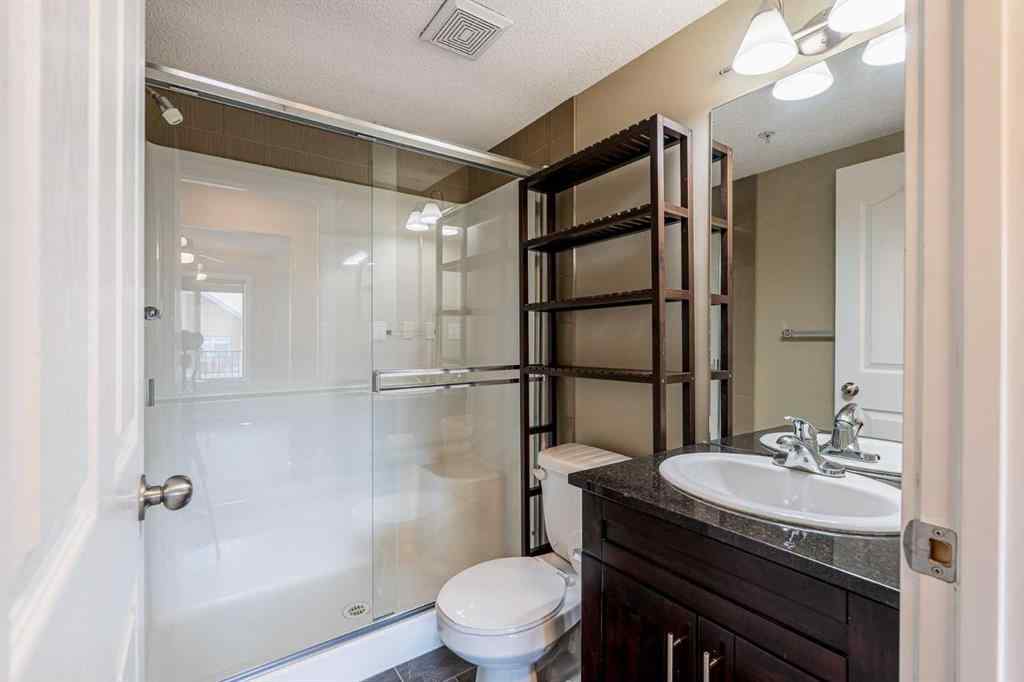 MLS® A2253595 - Unit #1407 403 Mackenzie Way SW in Downtown Airdrie, Residential