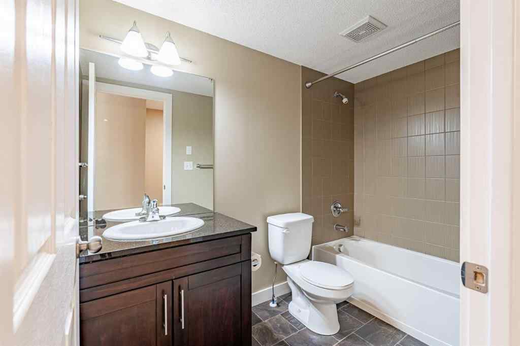 MLS® A2253595 - Unit #1407 403 Mackenzie Way SW in Downtown Airdrie, Residential