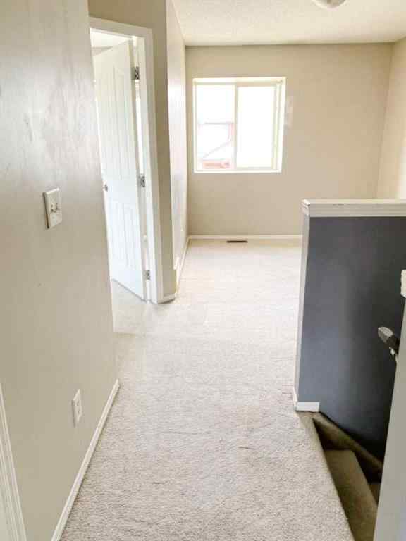 MLS® A2253599 - Unit #203 2066 Luxstone Boulevard SW in Luxstone Airdrie, Residential