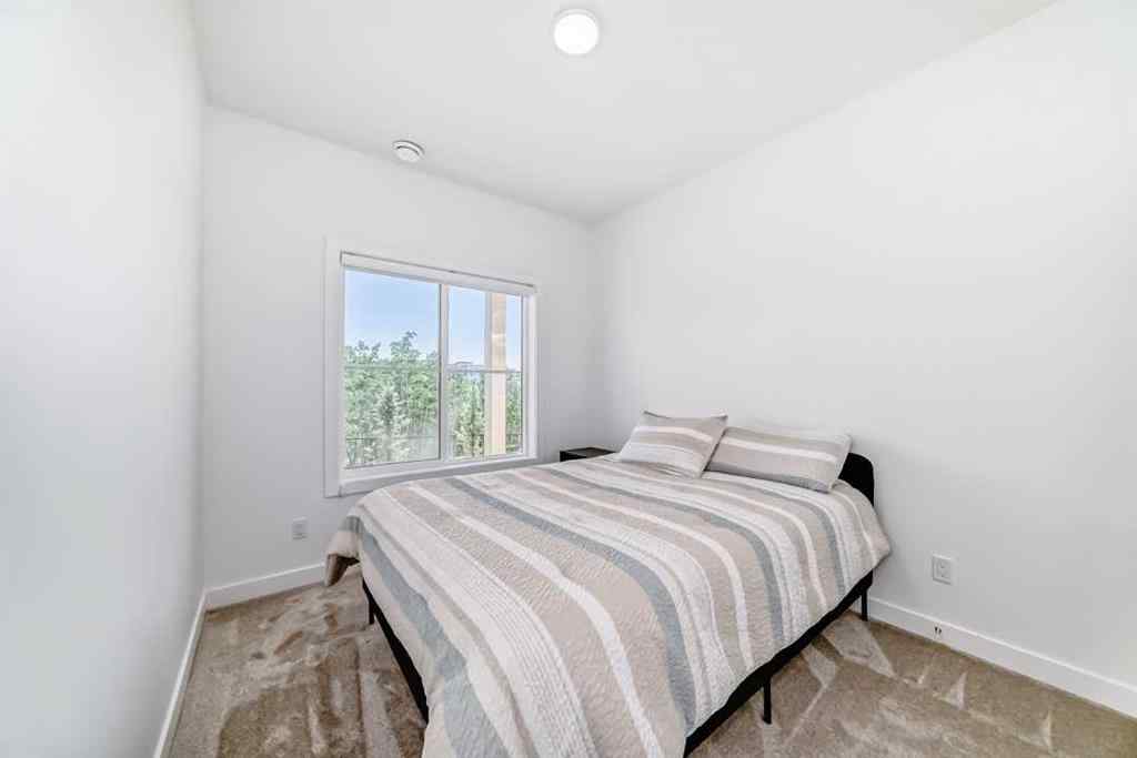 MLS® A2253606 - 53 Spring Creek Common SW in Springbank Hill Calgary, Residential