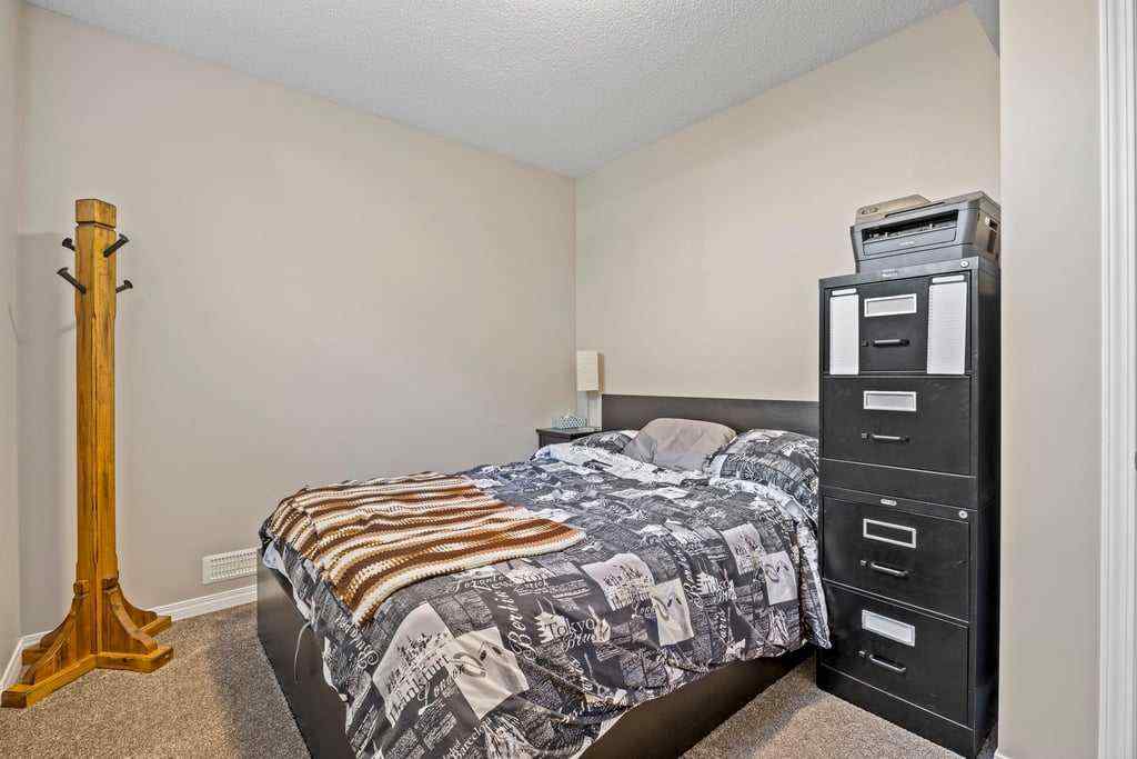 MLS® A2253650 - 512 River Heights Green  in River Song Cochrane, Residential
