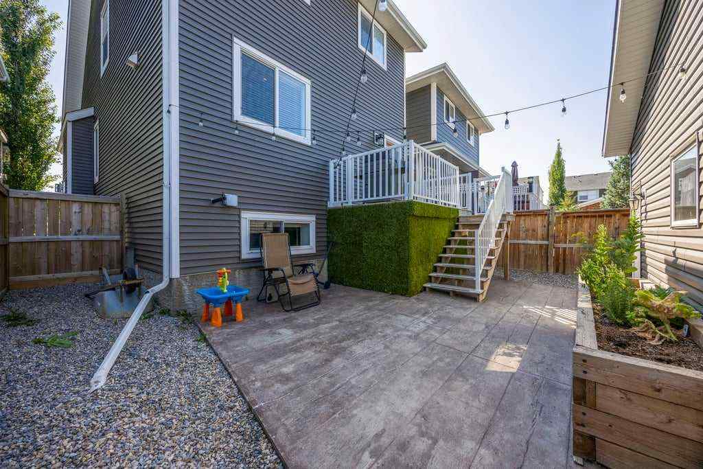 MLS® A2253650 - 512 River Heights Green  in River Song Cochrane, Residential