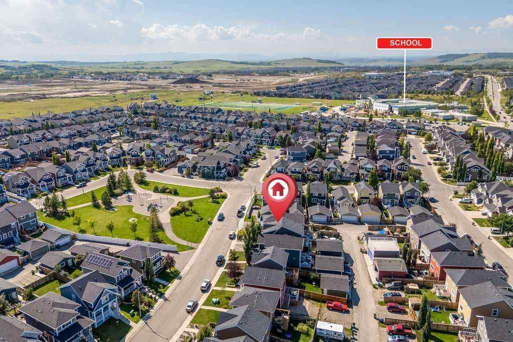 MLS® A2253650 - 512 River Heights Green  in River Song Cochrane, Residential