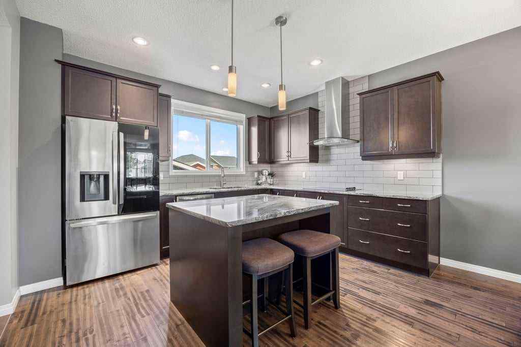 MLS® A2253650 - 512 River Heights Green  in River Song Cochrane, Residential