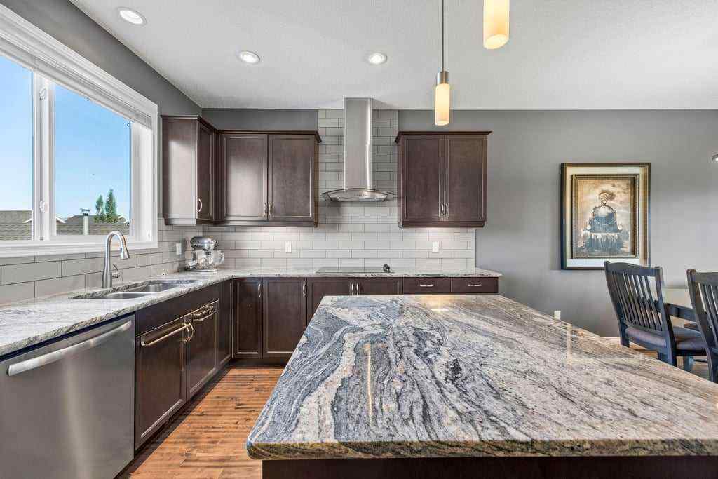 MLS® A2253650 - 512 River Heights Green  in River Song Cochrane, Residential