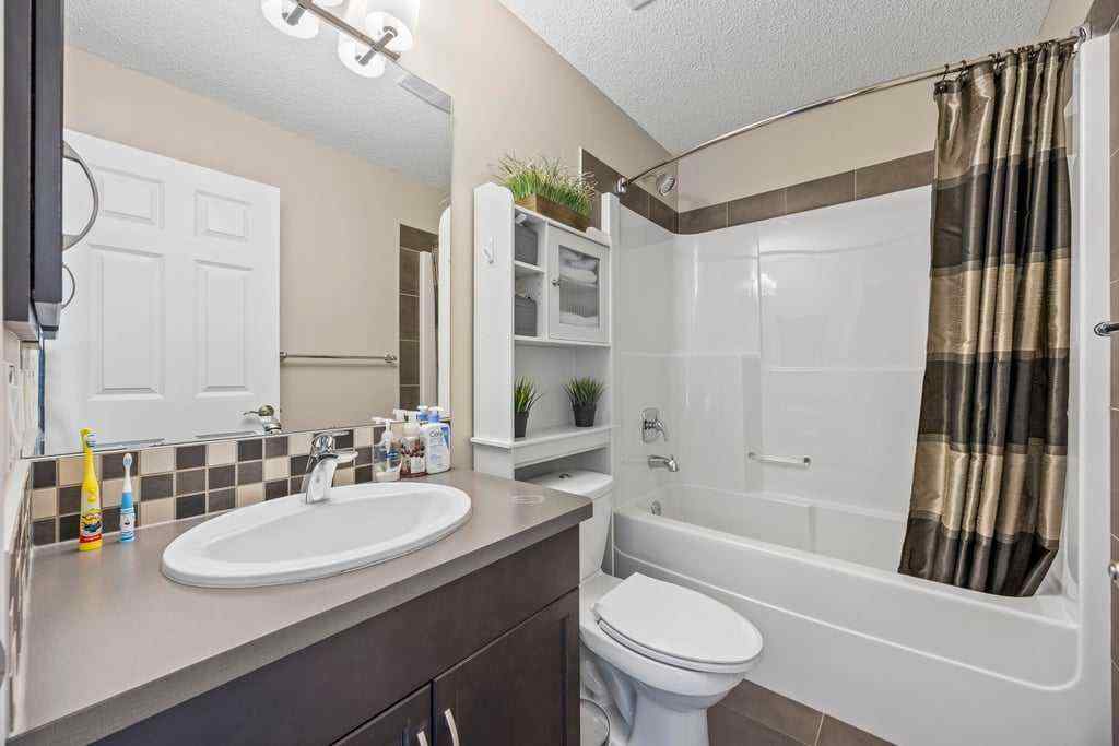MLS® A2253650 - 512 River Heights Green  in River Song Cochrane, Residential