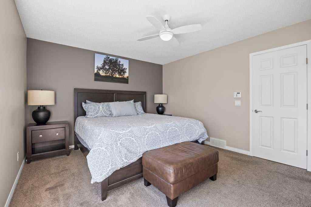 MLS® A2253650 - 512 River Heights Green  in River Song Cochrane, Residential