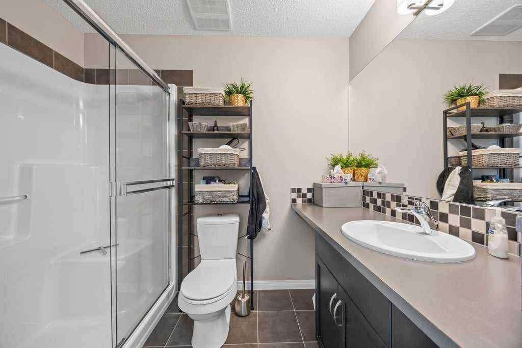 MLS® A2253650 - 512 River Heights Green  in River Song Cochrane, Residential