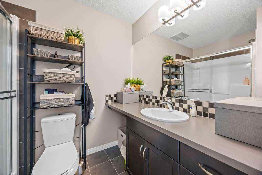 MLS® A2253650 - 512 River Heights Green  in River Song Cochrane, Residential