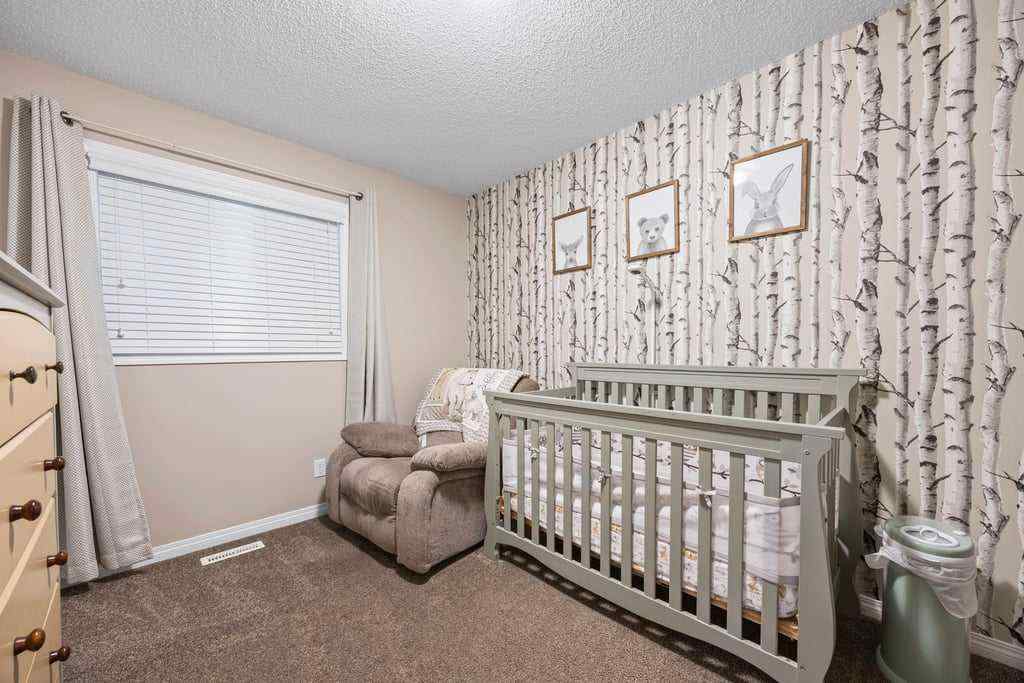 MLS® A2253650 - 512 River Heights Green  in River Song Cochrane, Residential