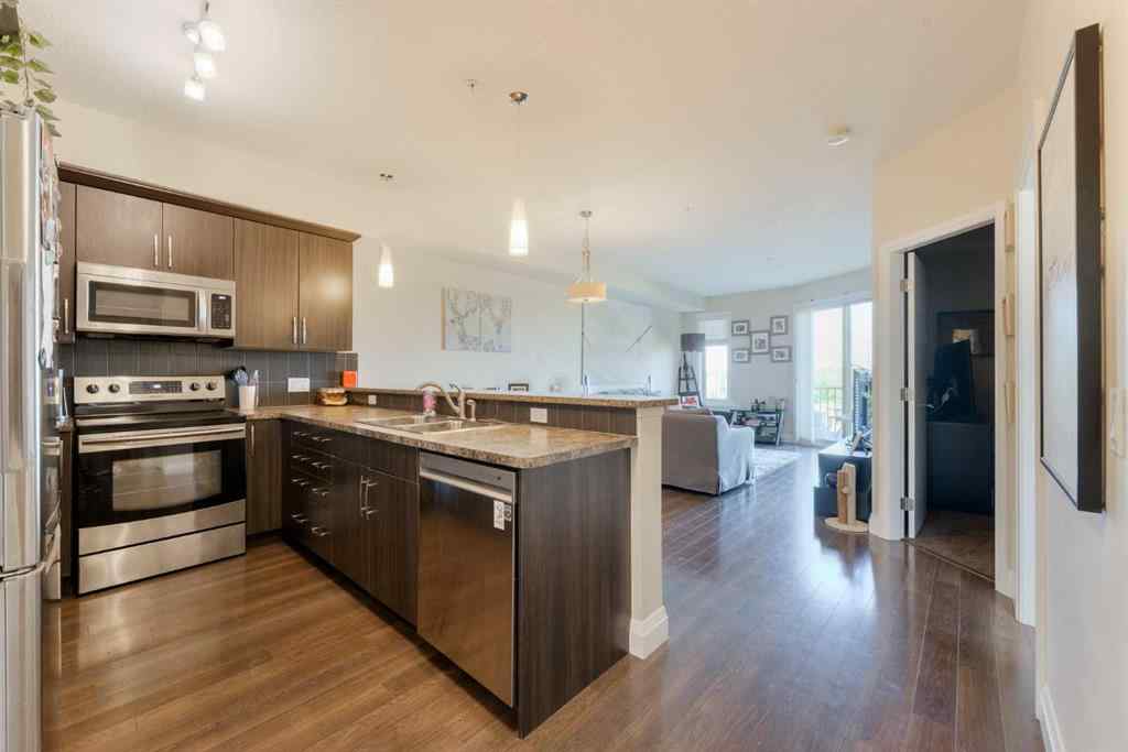 MLS® A2253678 - Unit #2105 15 Sunset Square  in Sunset Ridge Cochrane, Residential