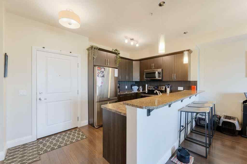 MLS® A2253678 - Unit #2105 15 Sunset Square  in Sunset Ridge Cochrane, Residential