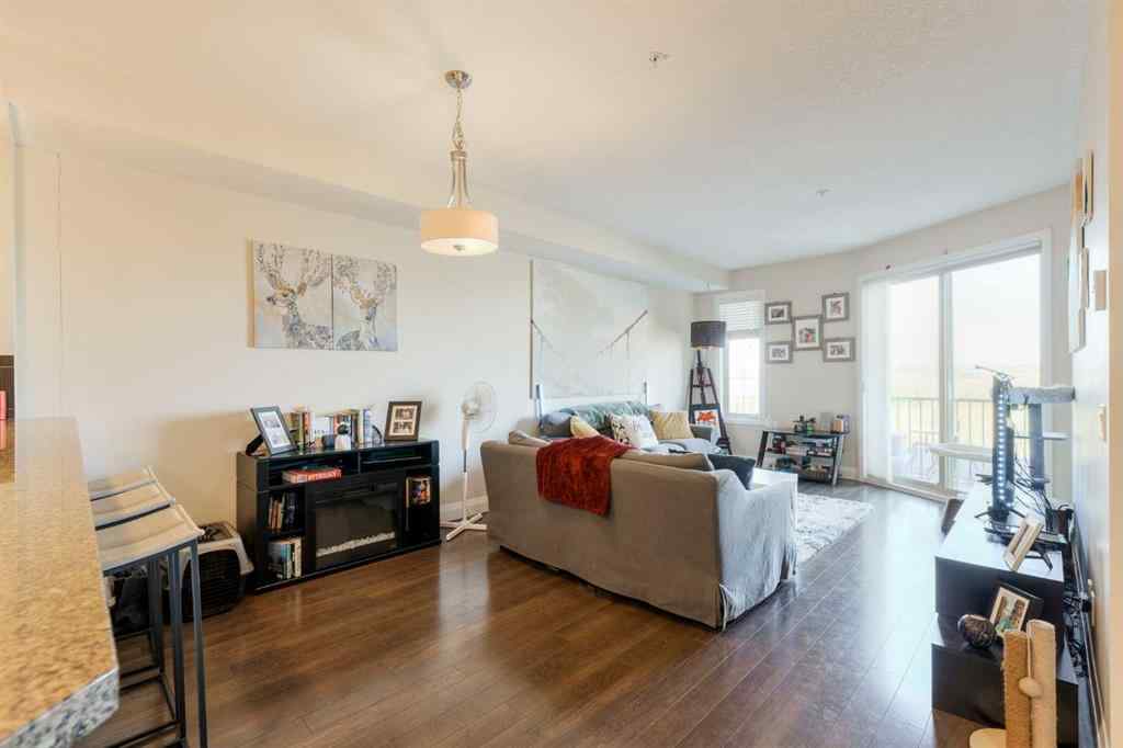 MLS® A2253678 - Unit #2105 15 Sunset Square  in Sunset Ridge Cochrane, Residential