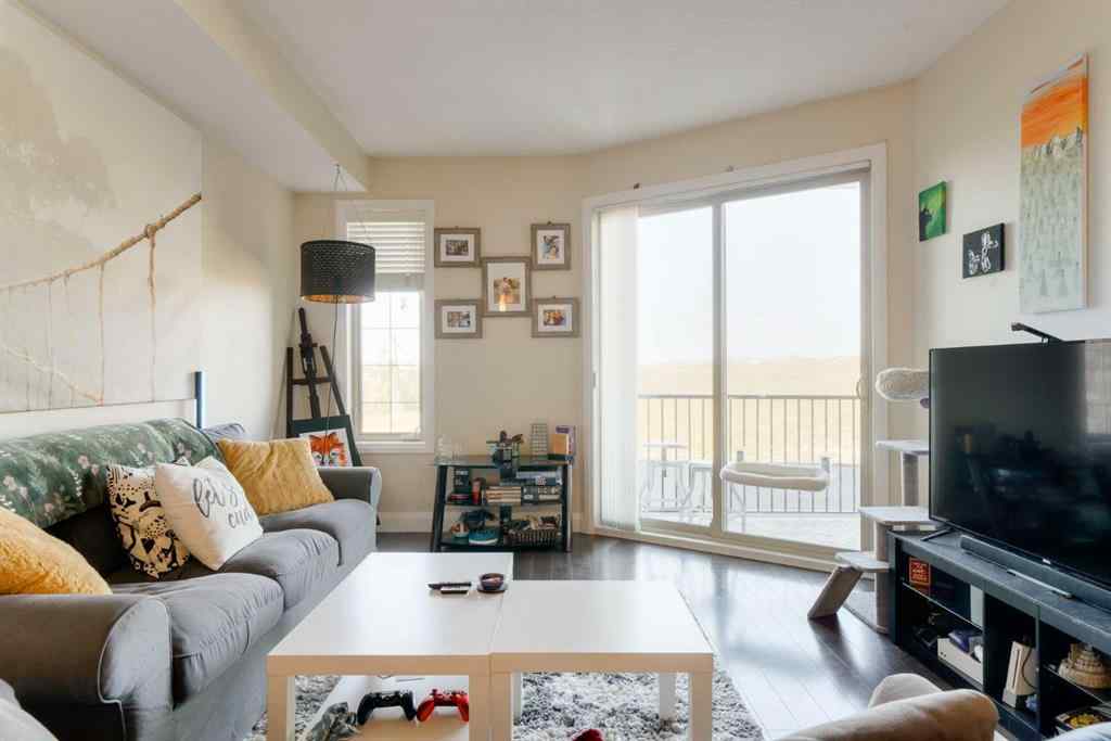 MLS® A2253678 - Unit #2105 15 Sunset Square  in Sunset Ridge Cochrane, Residential