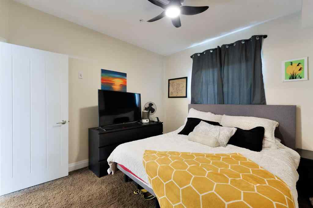 MLS® A2253678 - Unit #2105 15 Sunset Square  in Sunset Ridge Cochrane, Residential