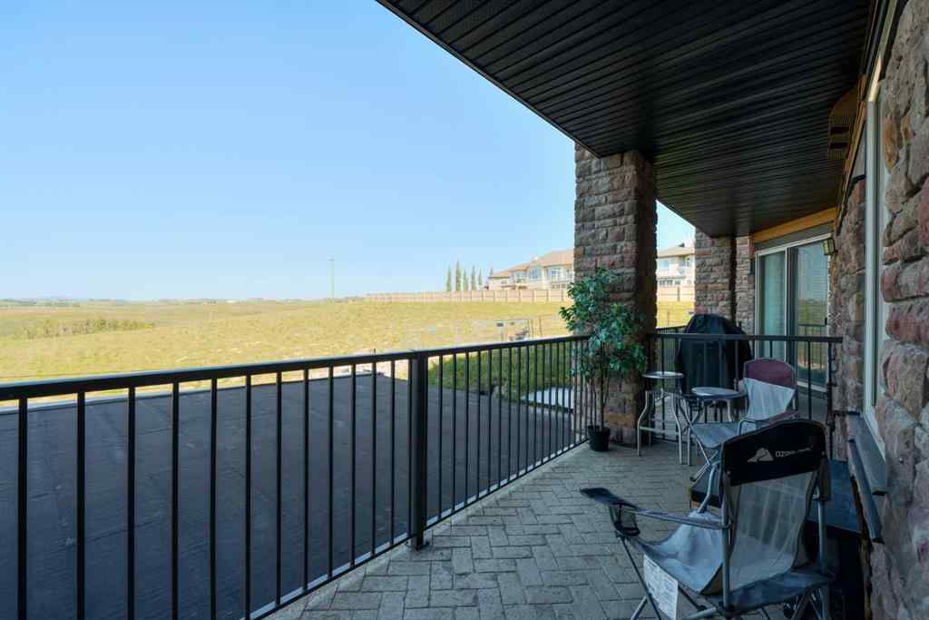 MLS® A2253678 - Unit #2105 15 Sunset Square  in Sunset Ridge Cochrane, Residential