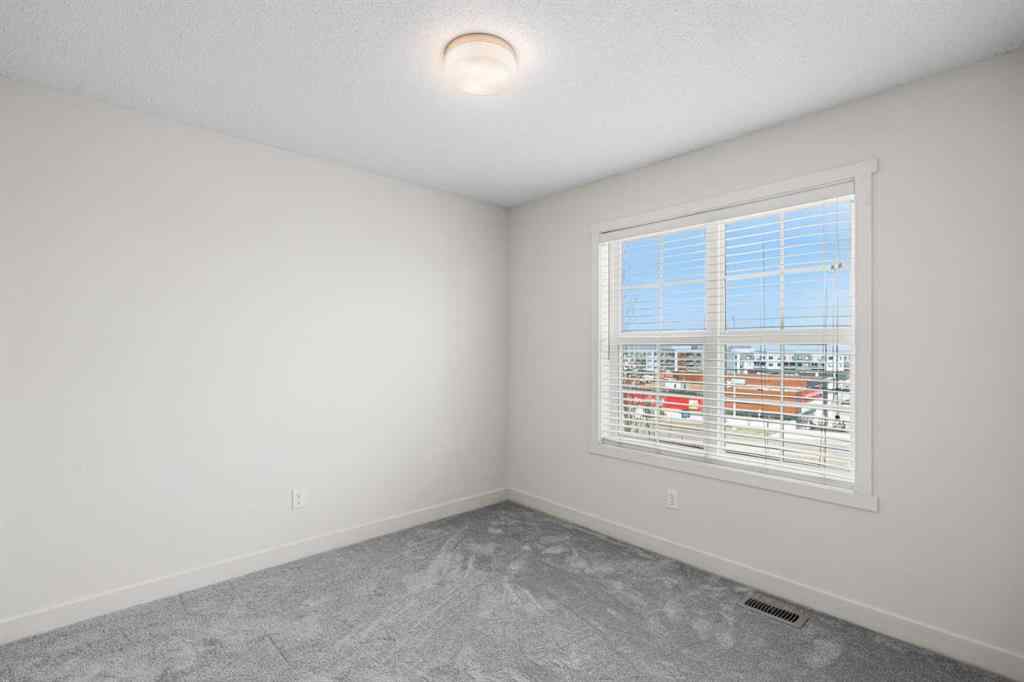 MLS® A2253710 - 202 Nolanfield Villas NW in Nolan Hill Calgary, Residential