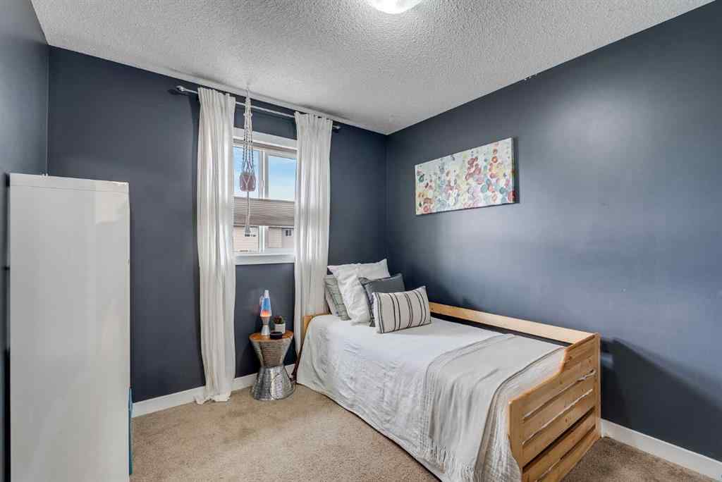 MLS® A2253732 - 1064 Kings Heights Road SE in Kings Heights Airdrie, Residential