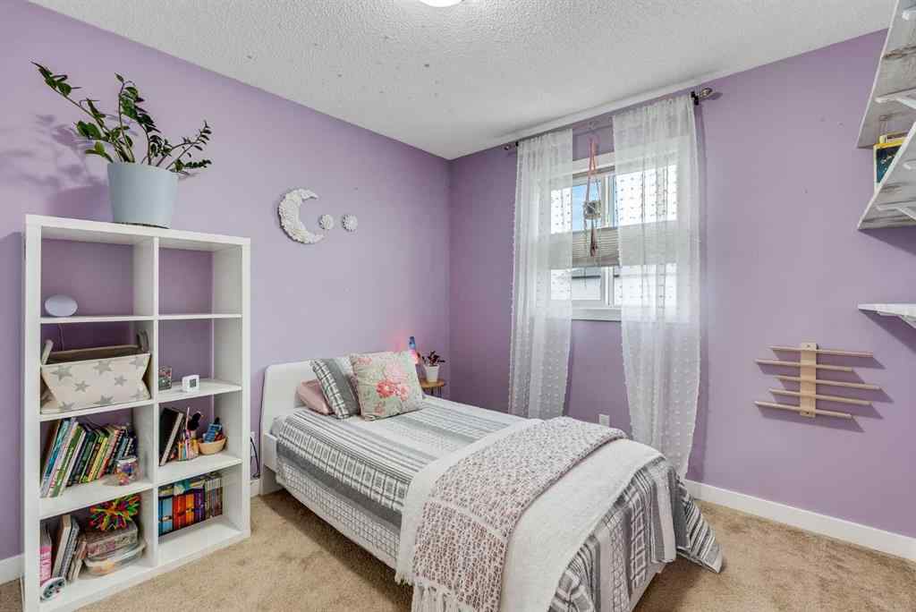 MLS® A2253732 - 1064 Kings Heights Road SE in Kings Heights Airdrie, Residential