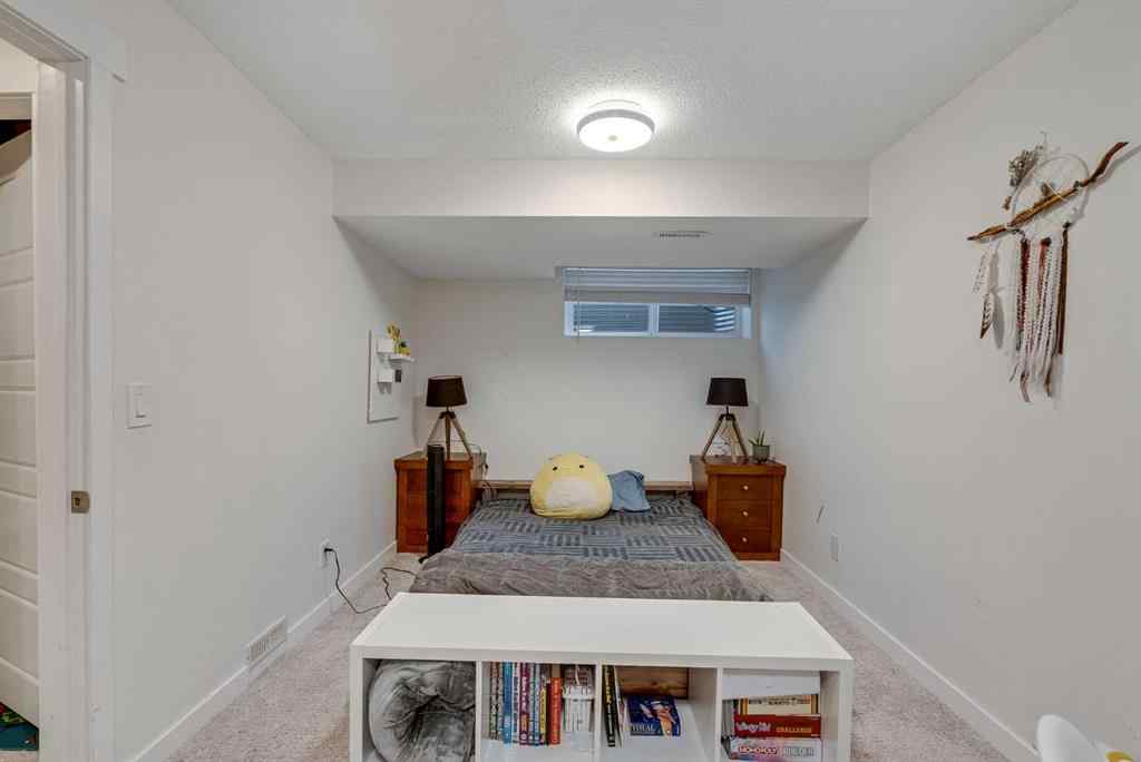 MLS® A2253732 - 1064 Kings Heights Road SE in Kings Heights Airdrie, Residential