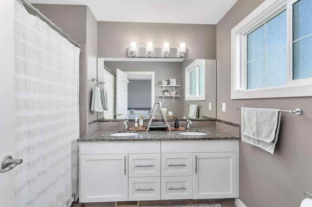 MLS® A2253747 - 22 Coachill Street  in Cottonwood Estates Blackfalds, Residential