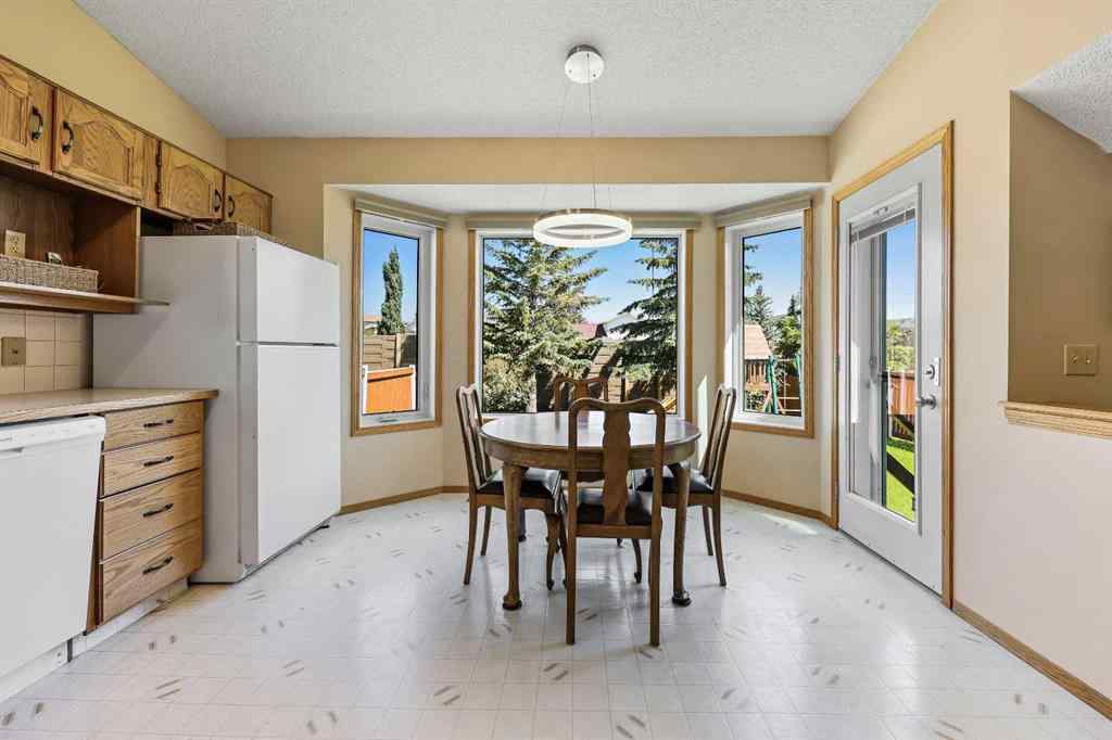 MLS® A2253748 - 104 Hawkmount Close NW in Hawkwood Calgary, Residential