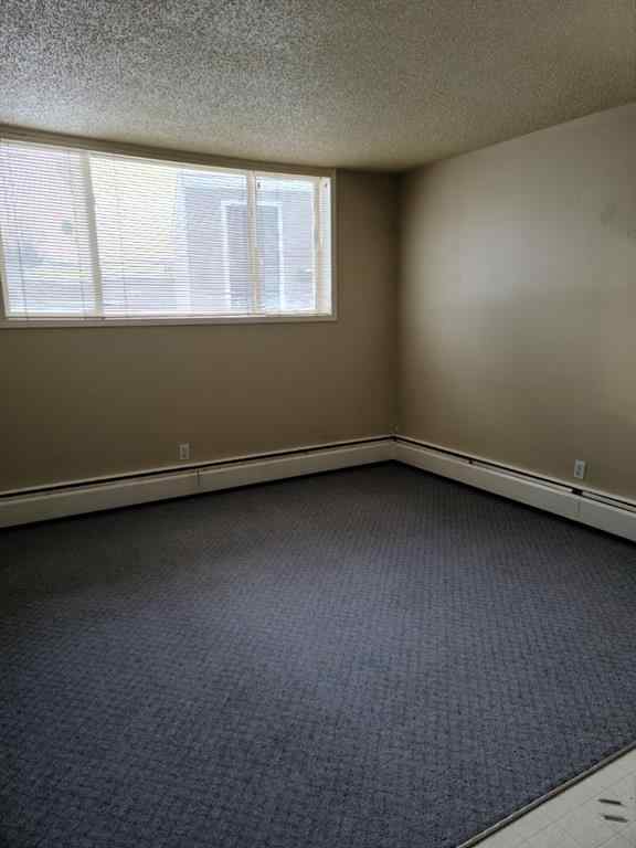 MLS® A2253757 - Unit #A8 9503 88 Avenue  in North End Peace River, Residential