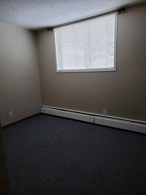 MLS® A2253757 - Unit #A8 9503 88 Avenue  in North End Peace River, Residential