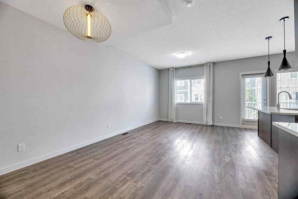 MLS® A2253796 - Unit #104 32 Red Embers Parade NE in Redstone Calgary, Residential