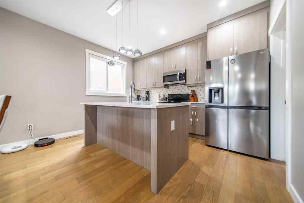 MLS® A2253837 - Unit #1 4517 Bowness Road NW in Montgomery Calgary, Residential
