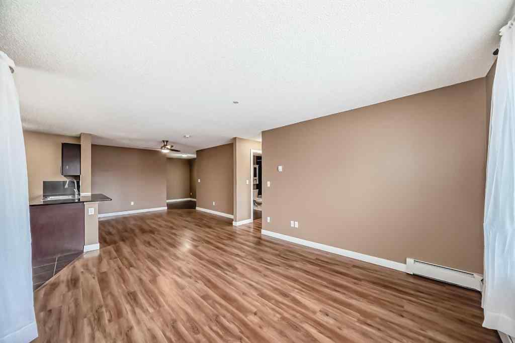 MLS® A2253839 - Unit #4320 403 Mackenzie Way SW in Downtown Airdrie, Residential