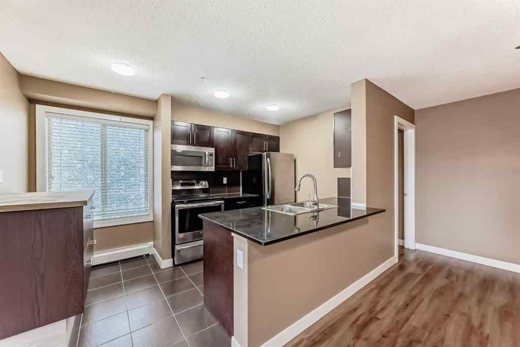 MLS® A2253839 - Unit #4320 403 Mackenzie Way SW in Downtown Airdrie, Residential
