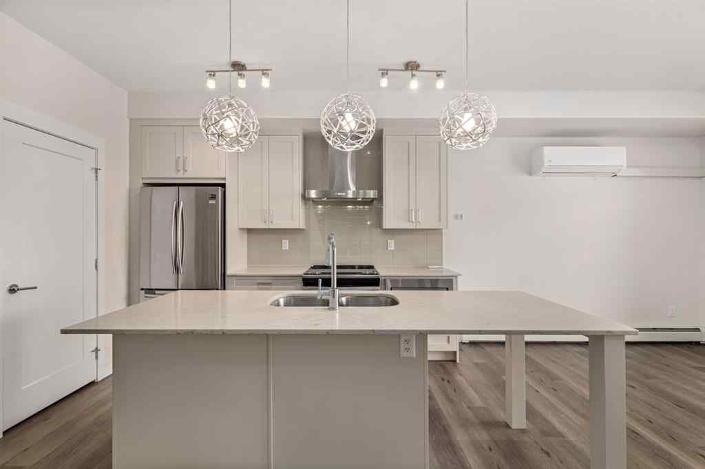 MLS® A2253857 - Unit #413 200 Auburn Meadows Common SE in Auburn Bay Calgary, Residential