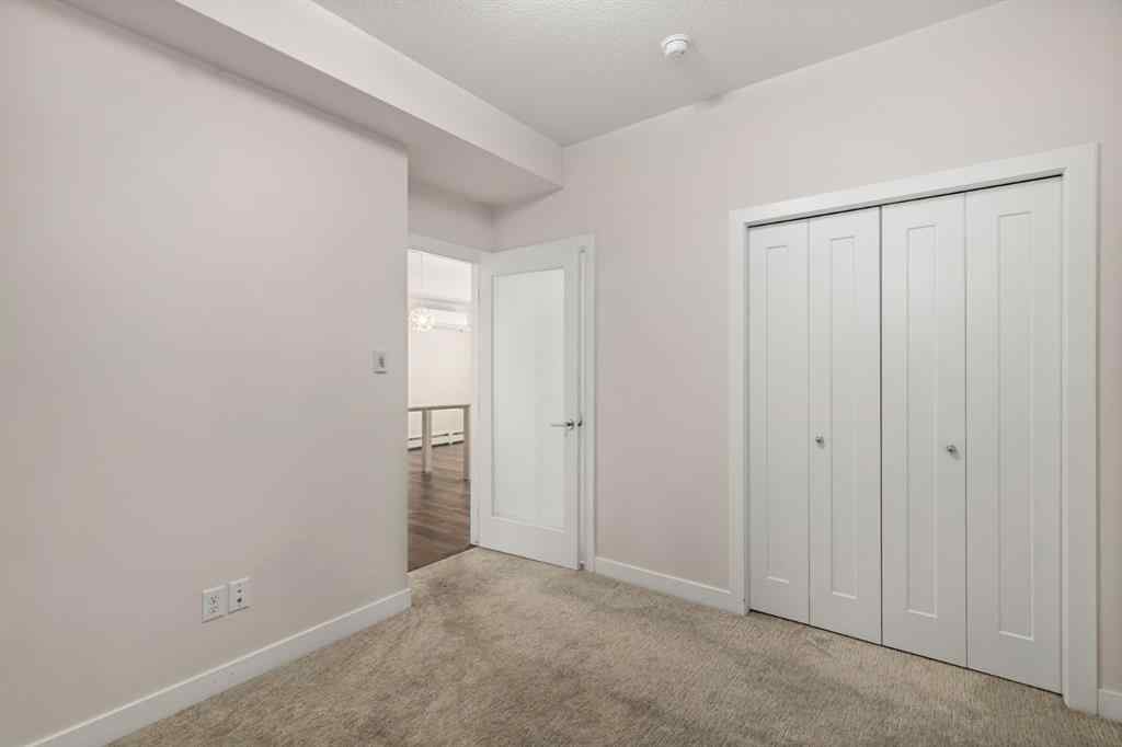 MLS® A2253857 - Unit #413 200 Auburn Meadows Common SE in Auburn Bay Calgary, Residential