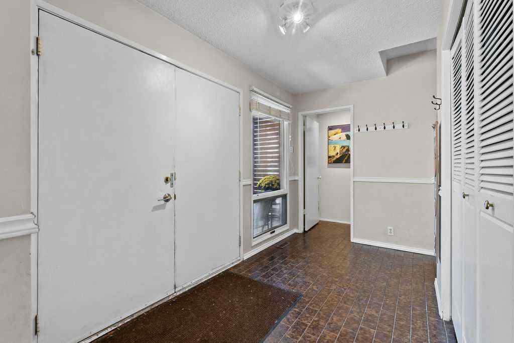MLS® A2253870 - 215 Ranchview Court NW in Ranchlands Calgary, Residential