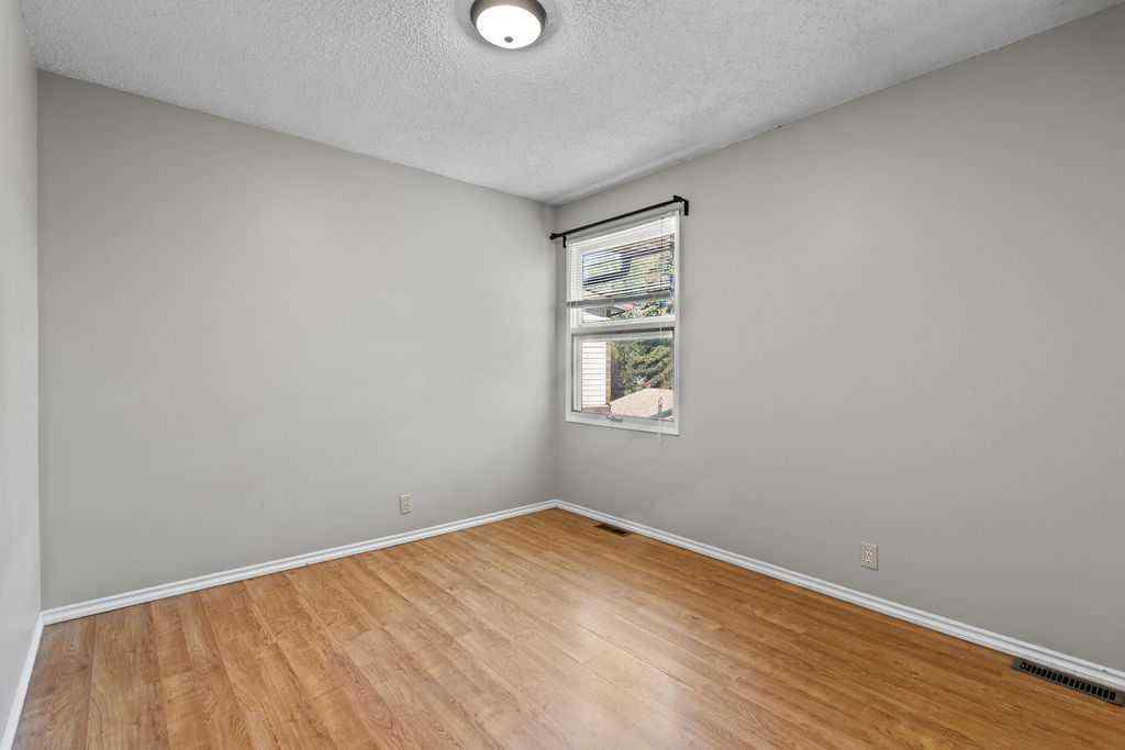 MLS® A2253870 - 215 Ranchview Court NW in Ranchlands Calgary, Residential