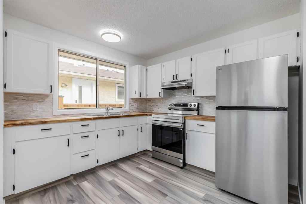 MLS® A2253881 - 1432 43 Street NE in Marlborough Calgary, Residential