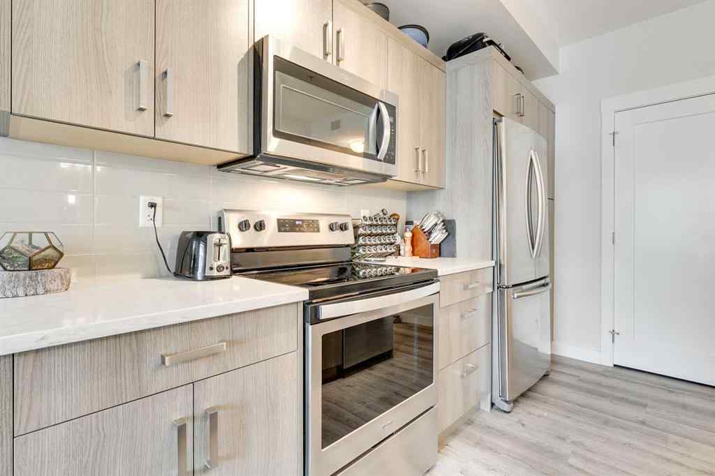 MLS® A2253898 - Unit #207 200 Auburn Meadows Common SE in Auburn Bay Calgary, Residential
