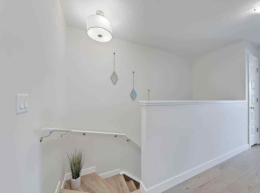 MLS® A2253910 - 67 Wolf Creek Drive SE in Wolf Willow Calgary, Residential