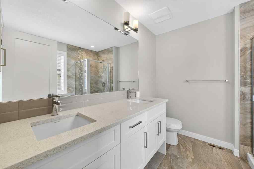 MLS® A2253921 - 405 Wentworth Row SW in West Springs Calgary, Residential